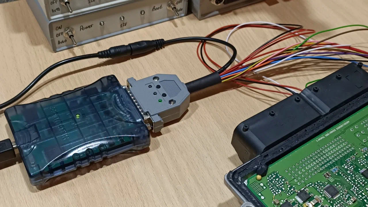 Scanmatik 3 connected to a module for programming.